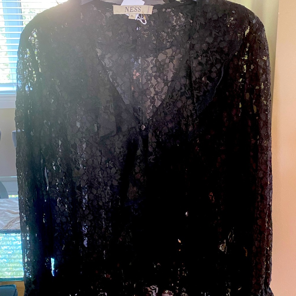 Black lace blouse with ruffles